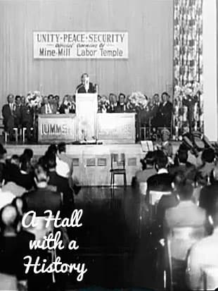 A black-and-white photo of the 1952 grand-opening ceremony, with a speaker at a podium beneath a Mine-Mill Labor Temple banner.